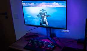 Right angled front view of the LG UltraGear 27GR95QE showing the desktop