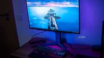 Right angled front view of the LG UltraGear 27GR95QE showing the desktop