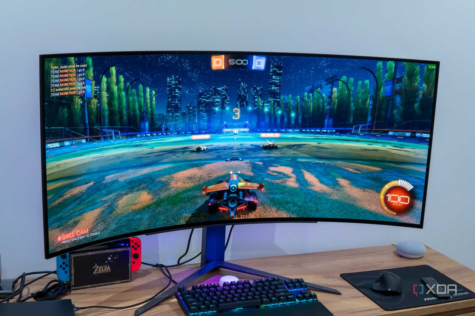 Angled front view of thew LG UltraGear 45GR95QE showing Rocket League