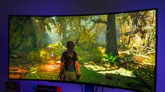 Angled front view of the LG UltraGear 45GR95QE monitor displaying Shadow of the Tomb Raider