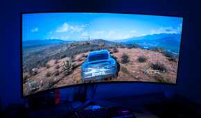 Angled front view of the LG UltraGear 45GR95QE displaying Forza Horizon 5