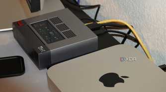 A Mac and a Mini PC connected to the Dell UltraSharp 34 monitor.