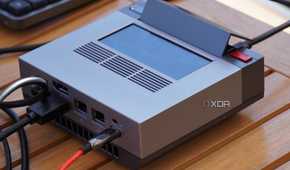 The Ayaneo Mini PC AM02 with cables connected.