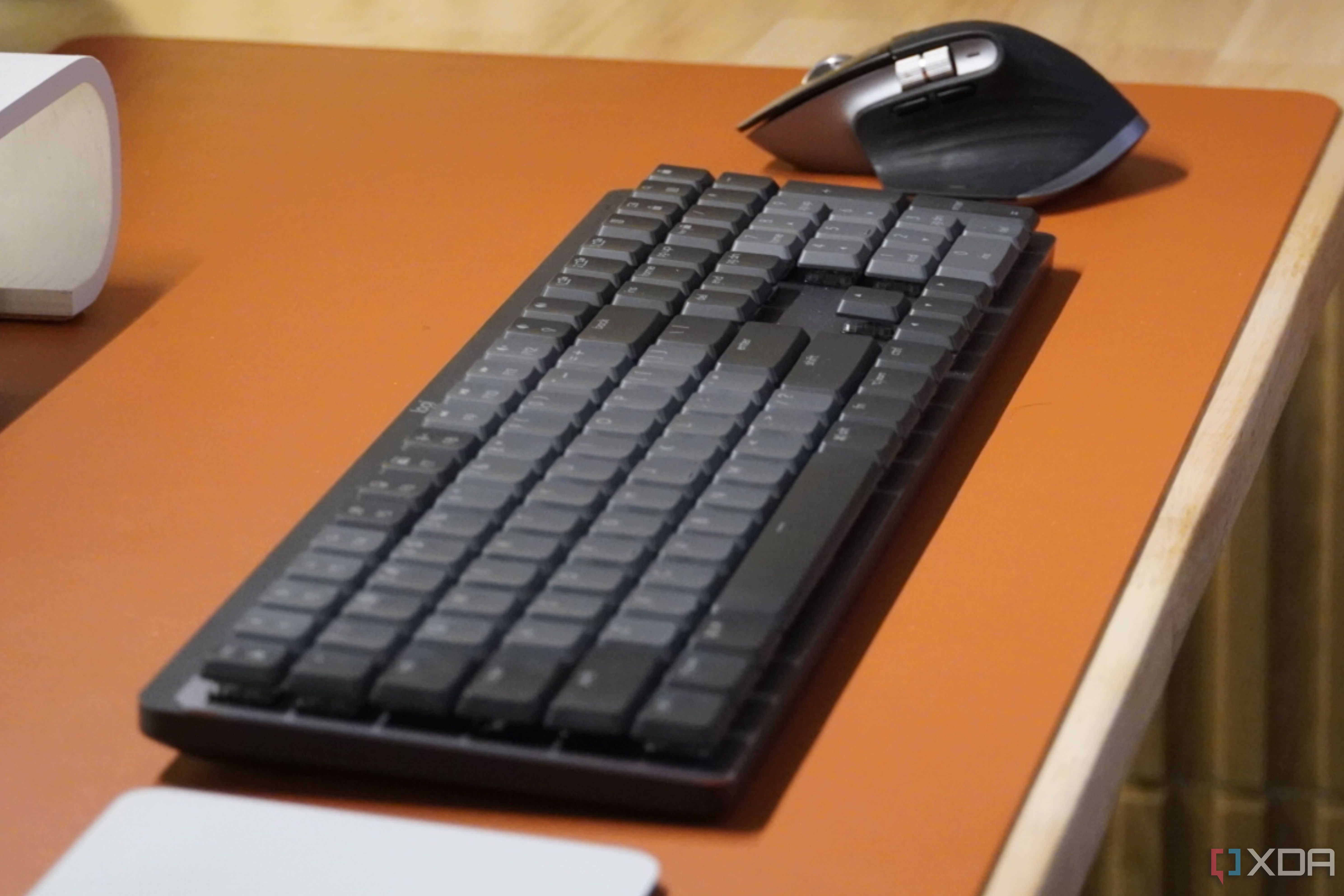 The MX Mechanical keyboard on a desk.