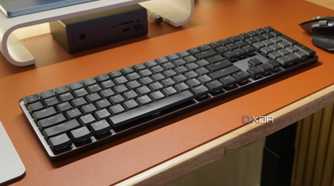 The Logitech MX Mechanical Keyboard as part of a desk setup.