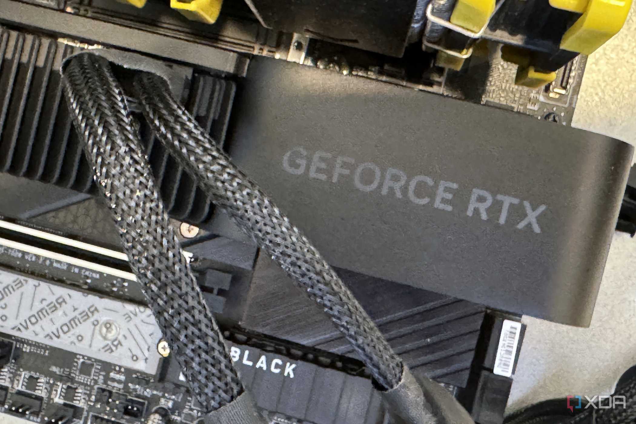 nvidia geforce rtx 4070 super founders edition installed on testbench showing power adapter