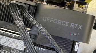 nvidia geforce rtx 4070 super founders edition installed on testbench showing power adapter