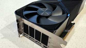 closeup of the i/o shield of the nvidia geforce rtx 4080 super showing the exhaust vents and large fan