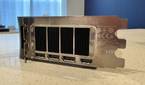 end view of the nvidia geforce rtx 4080 super fe io shield showing all four ports and the exhaust fan grille