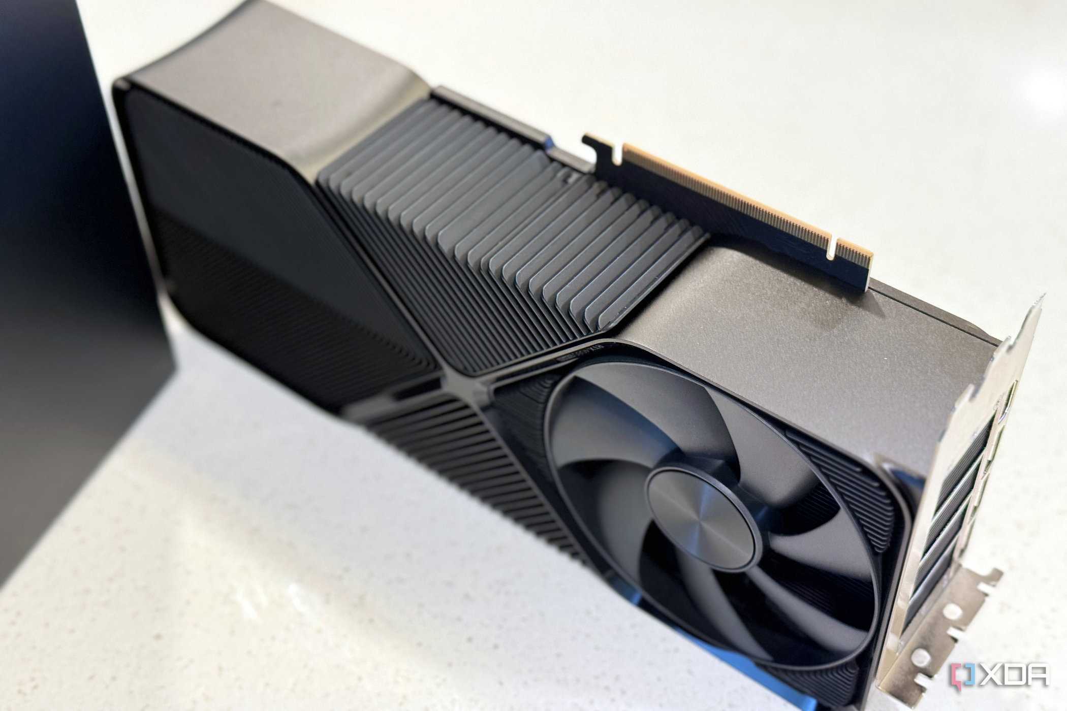 nvidia geforce rtx 4080 super fe stood up on its side to show how thick it is