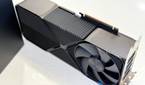 nvidia geforce rtx 4080 super fe stood up on its side to show how thick it is