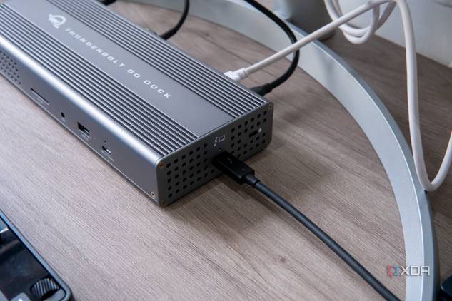 Angled view of the OWC Thunderbolt Go DOck showing the host connection and the front ports