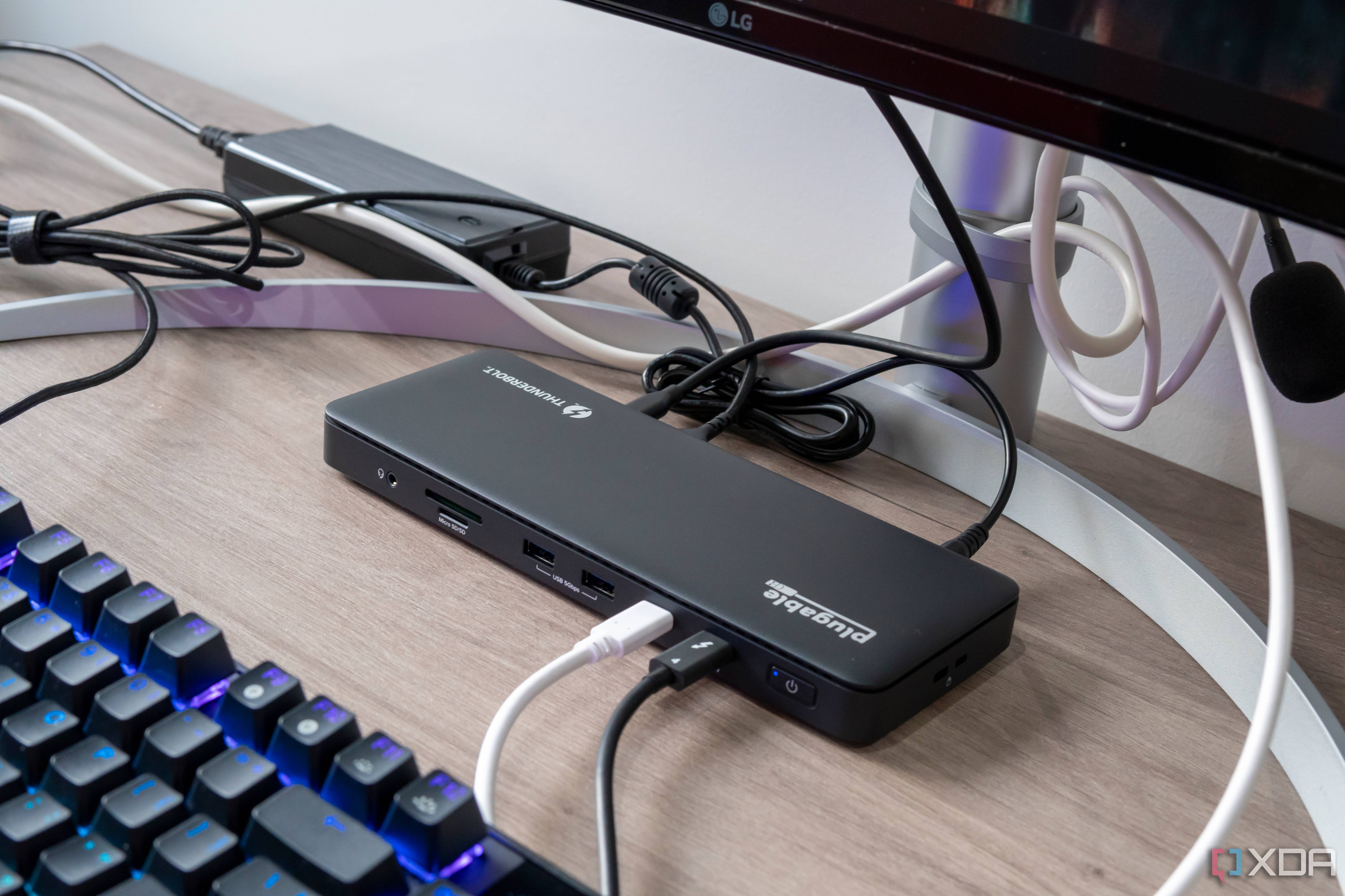 Angled view of the Plugable TBT4-UD5 in a desk setup
