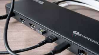 Close-up of the USB ports on the back of the Plugable TBT4-UD5 docking station with peripherals connected