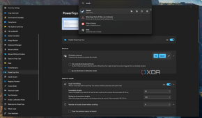 Screenshot of PowerToys Run open over the settings window
