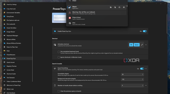 Screenshot of PowerToys Run open over the settings window