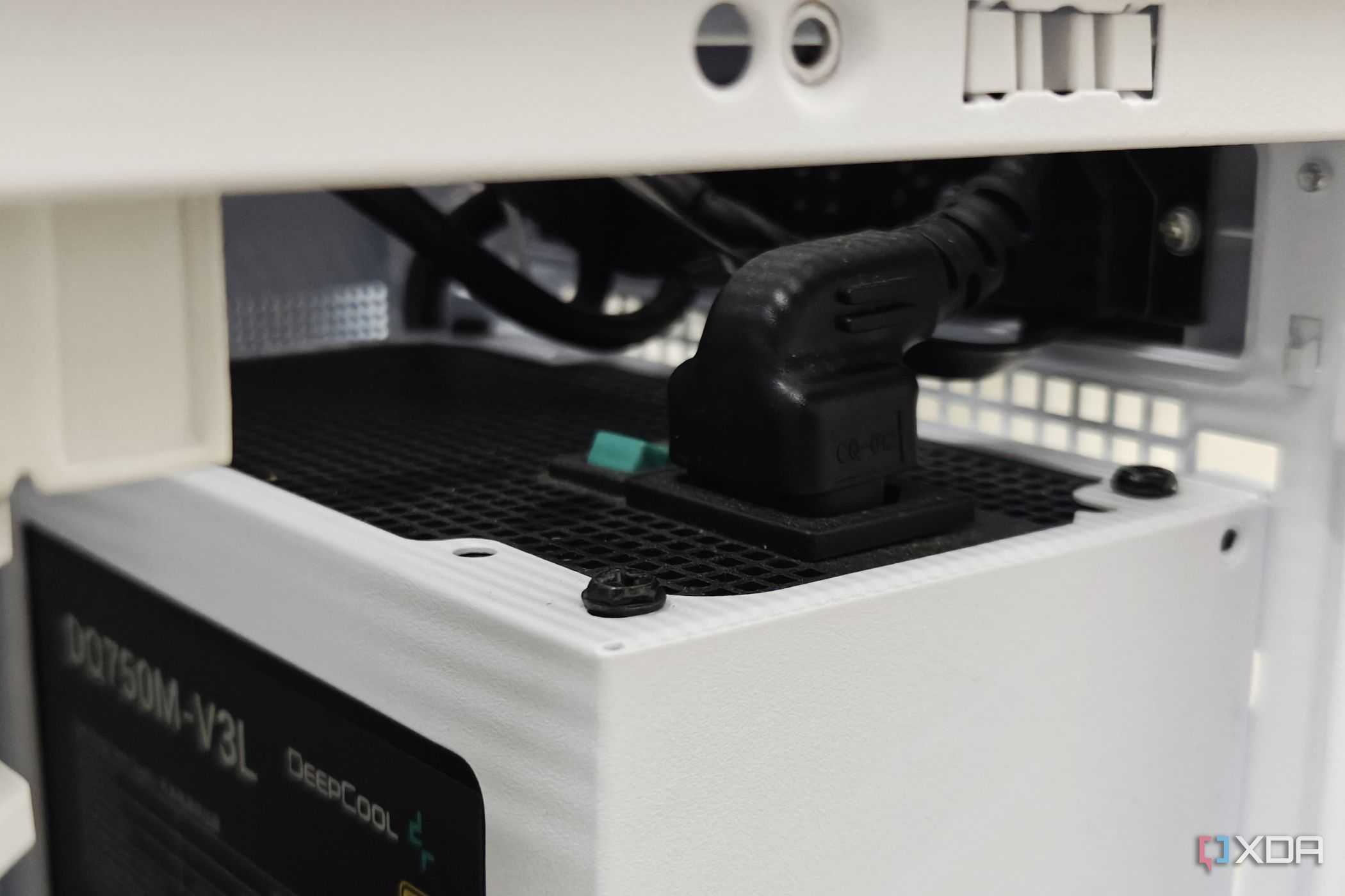 An image showing a PSU power switch and cable.