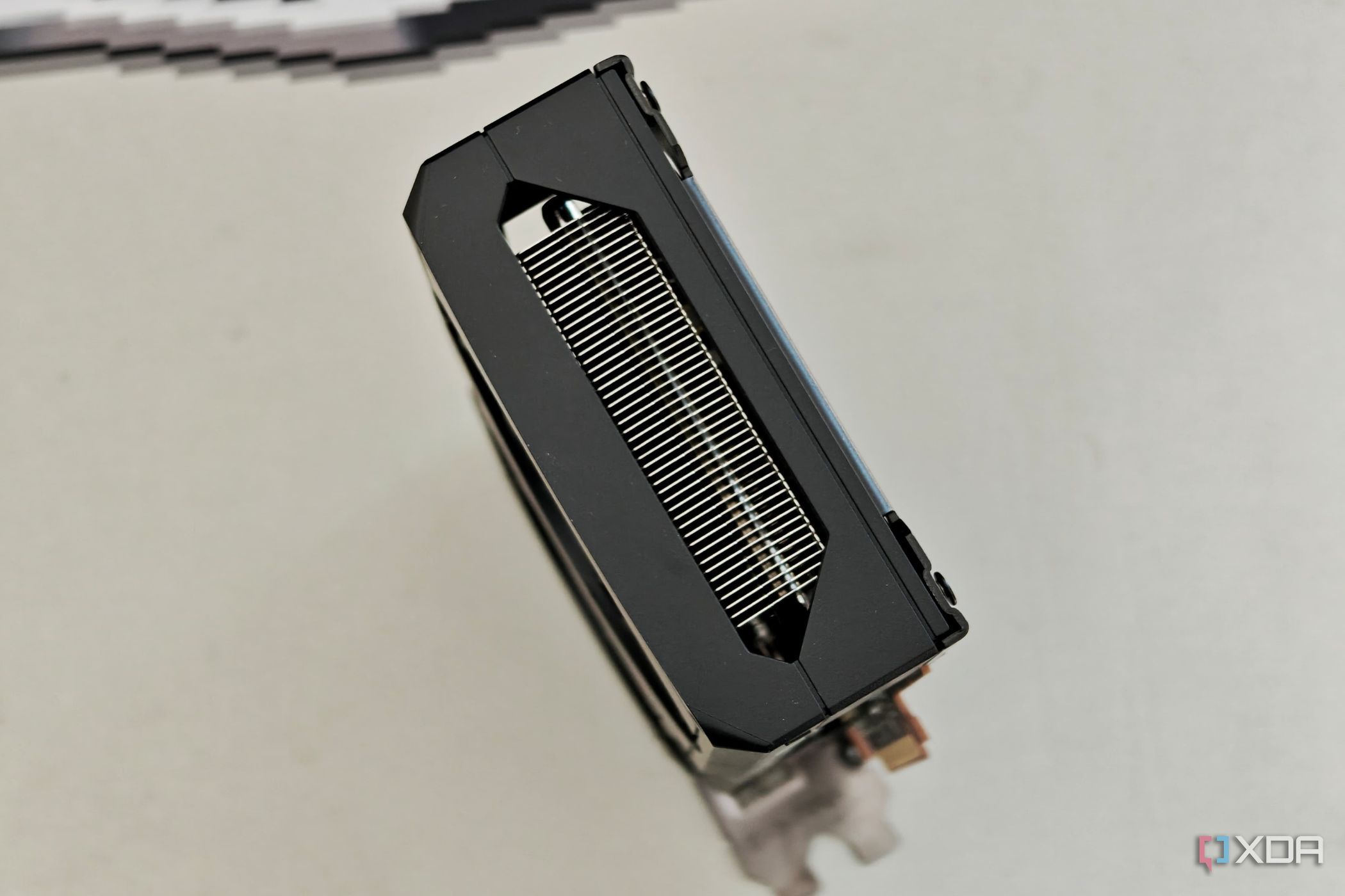 An image showing the top profile of the Sapphire Radeon RX 7600 Pulse OC GPU.
