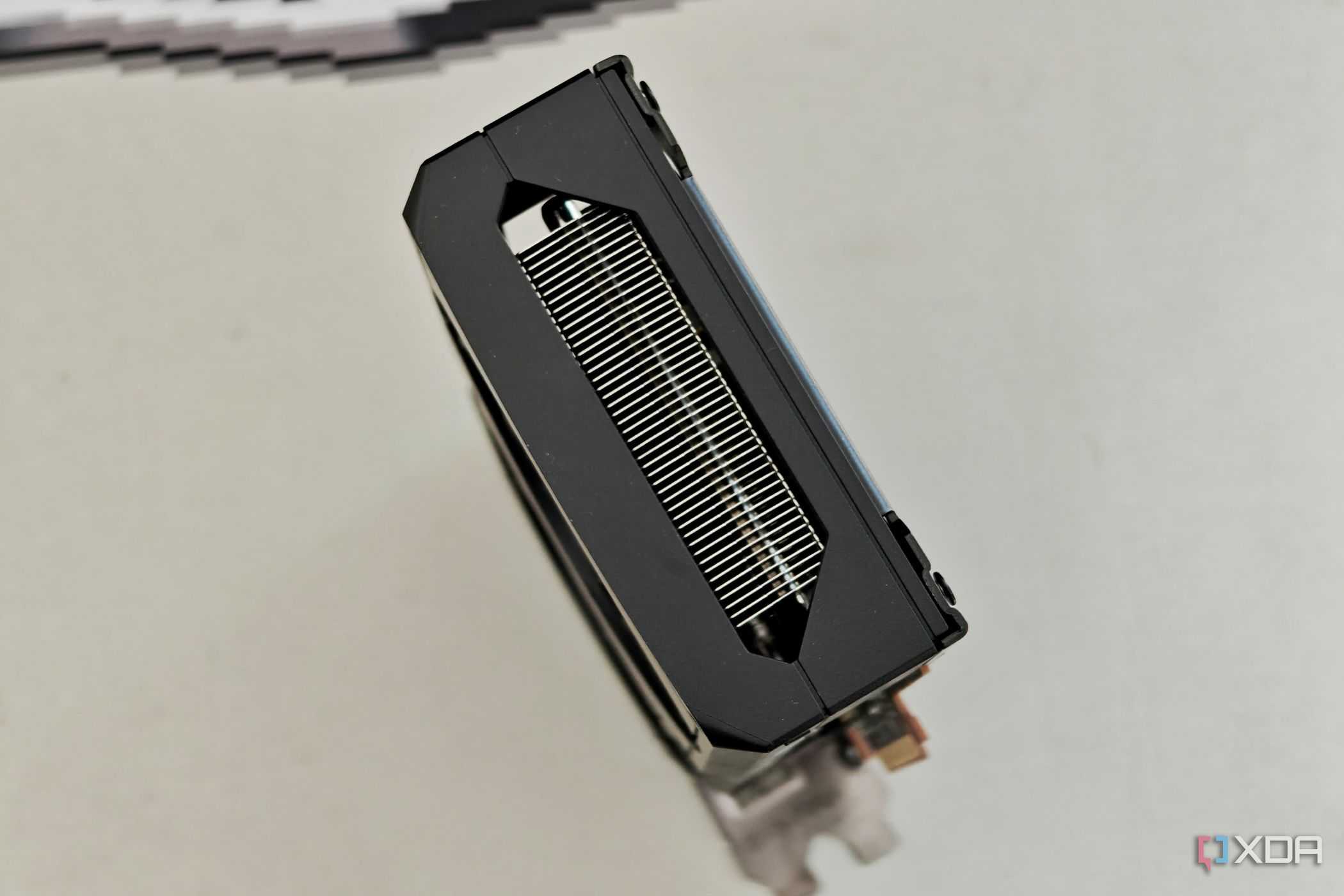 An image showing the top profile of the Sapphire Radeon RX 7600 Pulse OC GPU.
