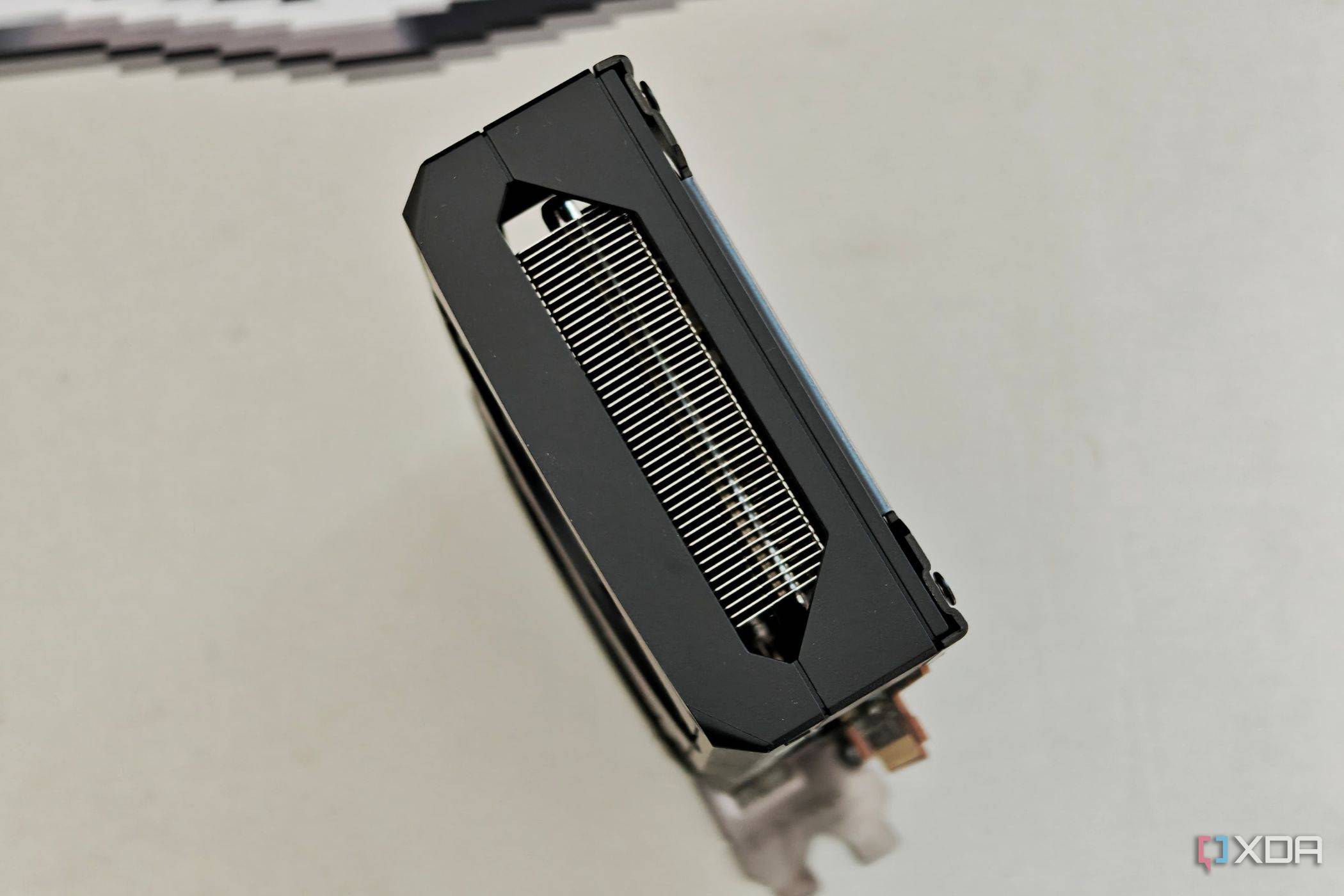 An image showing the top profile of the Sapphire Radeon RX 7600 Pulse OC GPU.