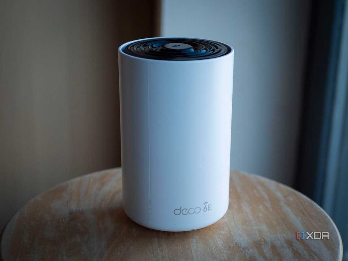 TP-Link Deco XE75 node sitting on a table