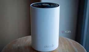 TP-Link Deco XE75 node sitting on a table