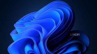 A screenshot showing the Windows 11 Blossam wallpaper with the dark theme enabled.