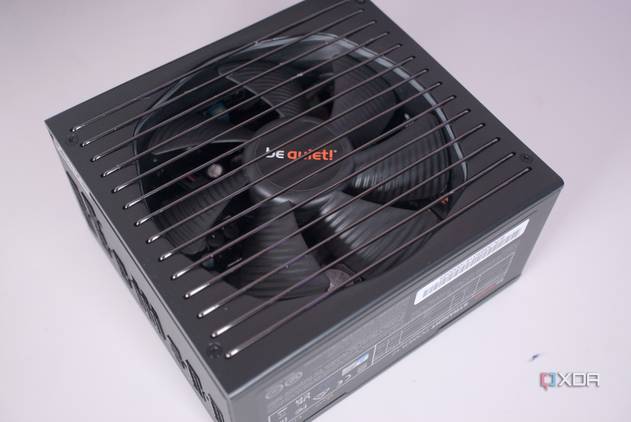 be quiet! Pure Power 12 M 850W power supply on a white desk.