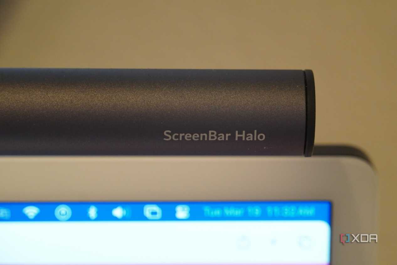 The BenQ ScrenBar Halo in front of an iMac.