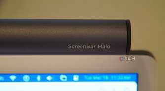 The BenQ ScrenBar Halo in front of an iMac.
