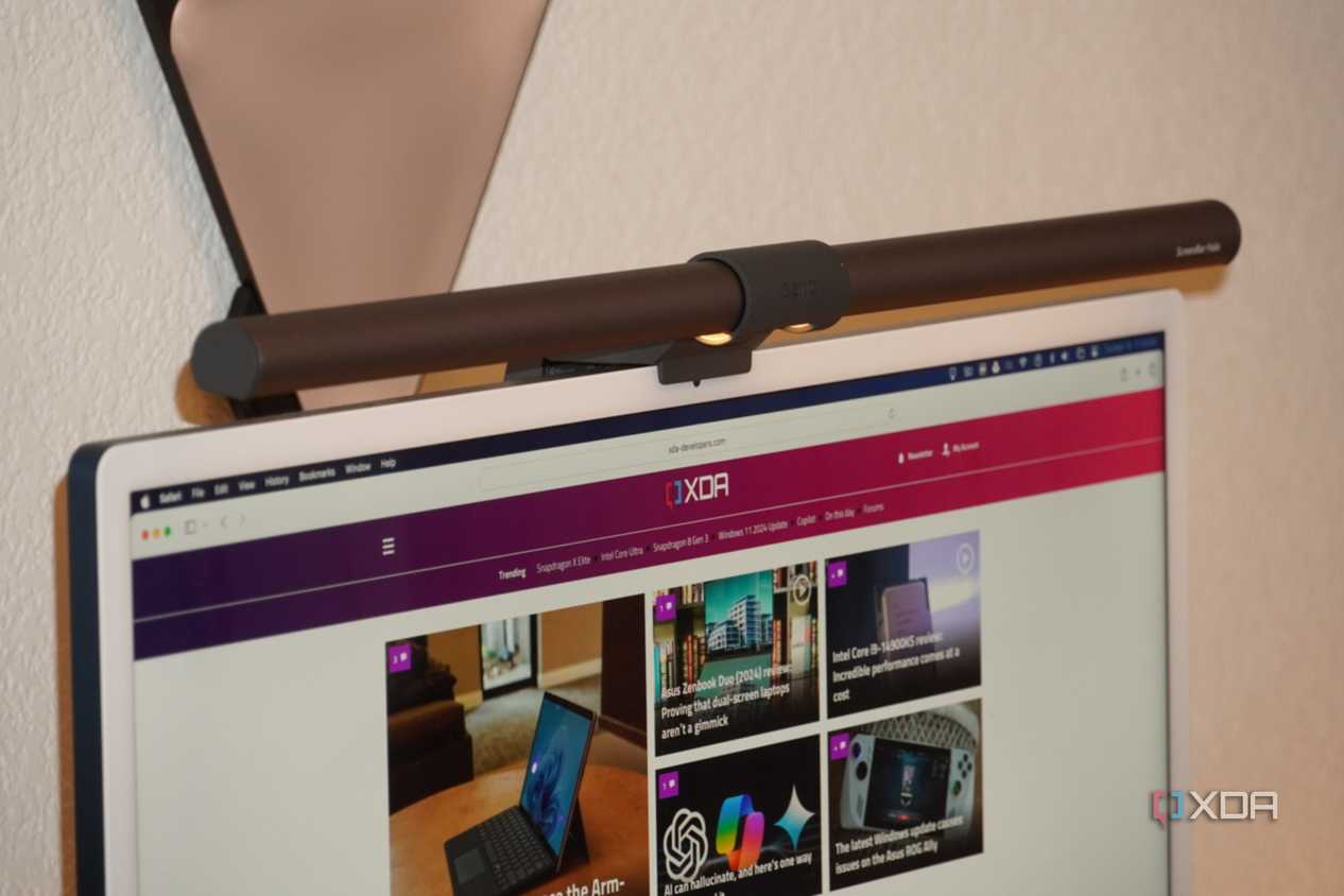 A close-up of the BenQ ScreenBar Halo on an iMac.