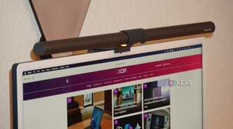 A close-up of the BenQ ScreenBar Halo on an iMac.