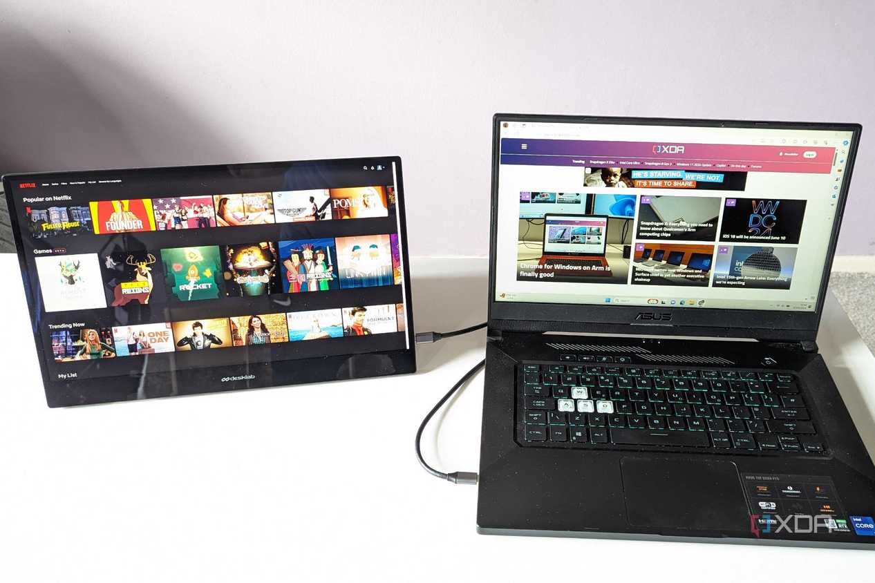 desklabs portable monitor showing netflix laptop showing xda website