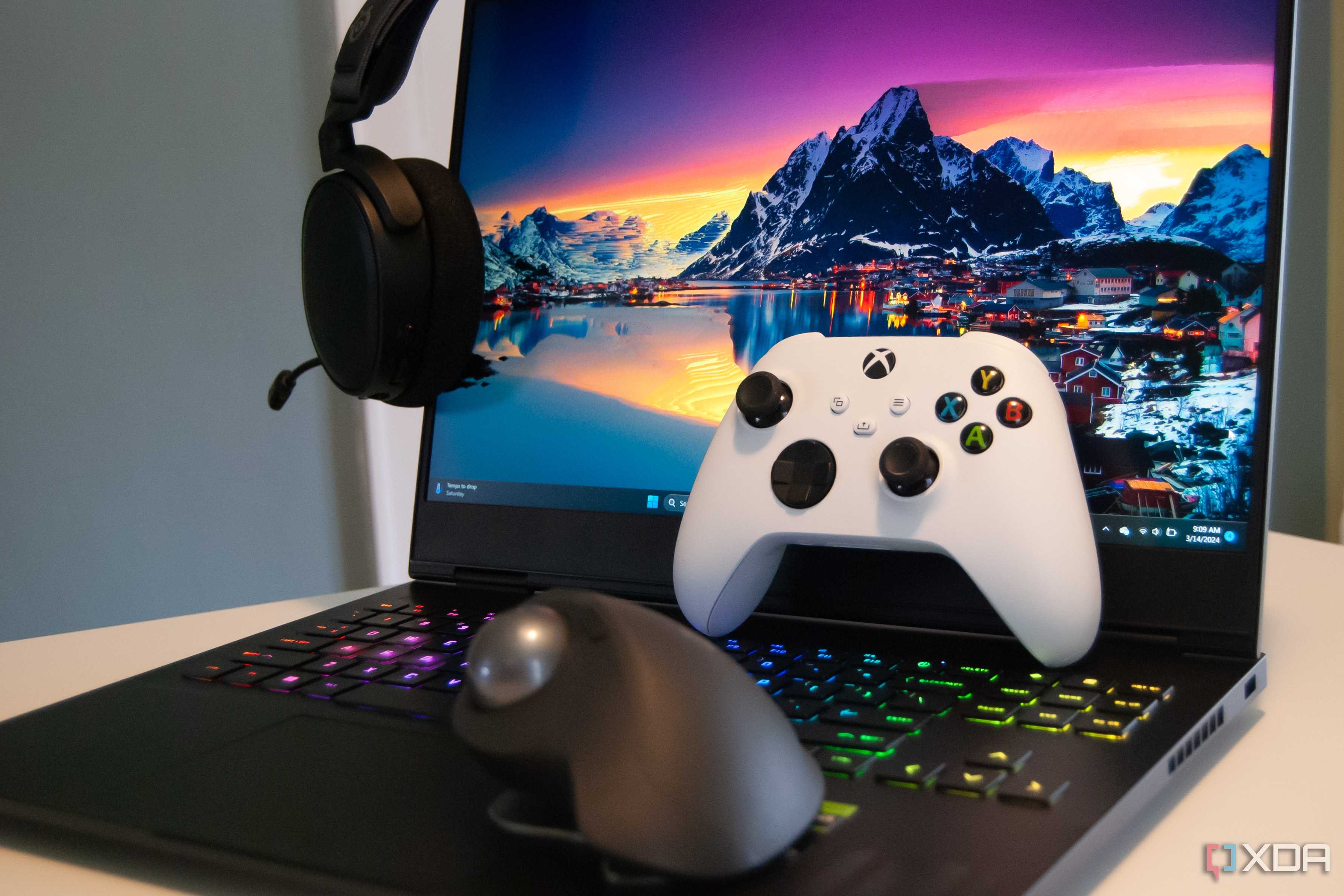 A collection of gaming accessories with an HP Omen in the background
