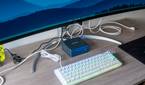 A Geekom Mini IT13 in a desk setup