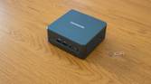 Geekom Mini IT13 mini PC on a wooden desk