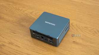 Angled rear view Geekom Mini IT13 mini PC on a wooden table