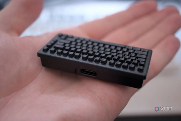 Holding the Keychron wireless receiver