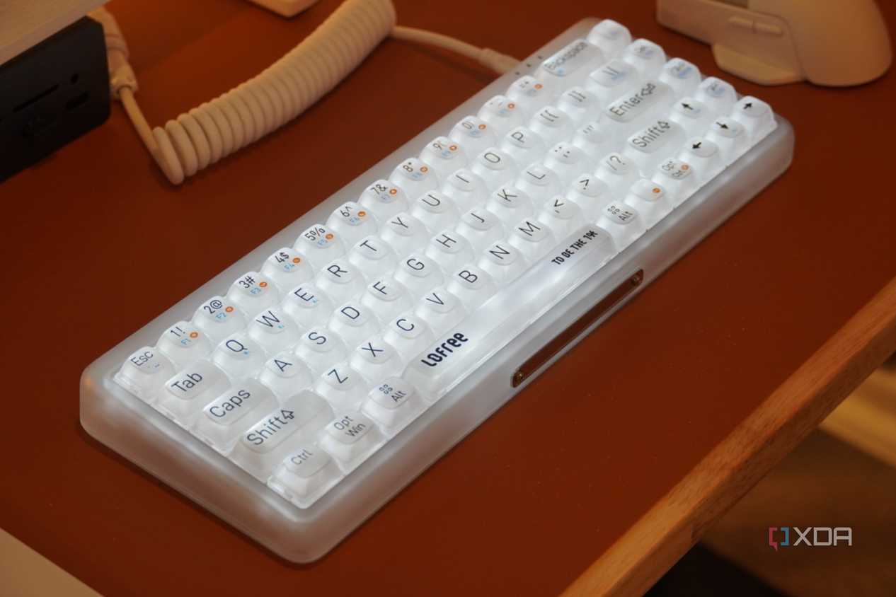 The Lofree 1% "Misty" mechanical keyboard on a desk.