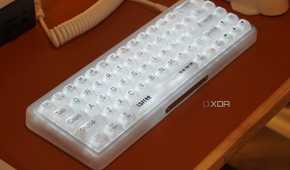The Lofree 1% "Misty" mechanical keyboard on a desk.
