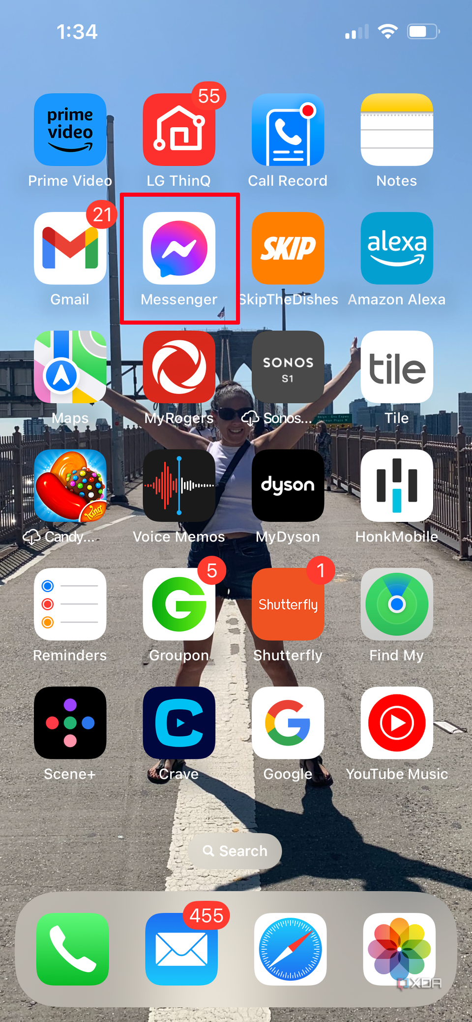 iPhone Home screen with the Messenger app selected.