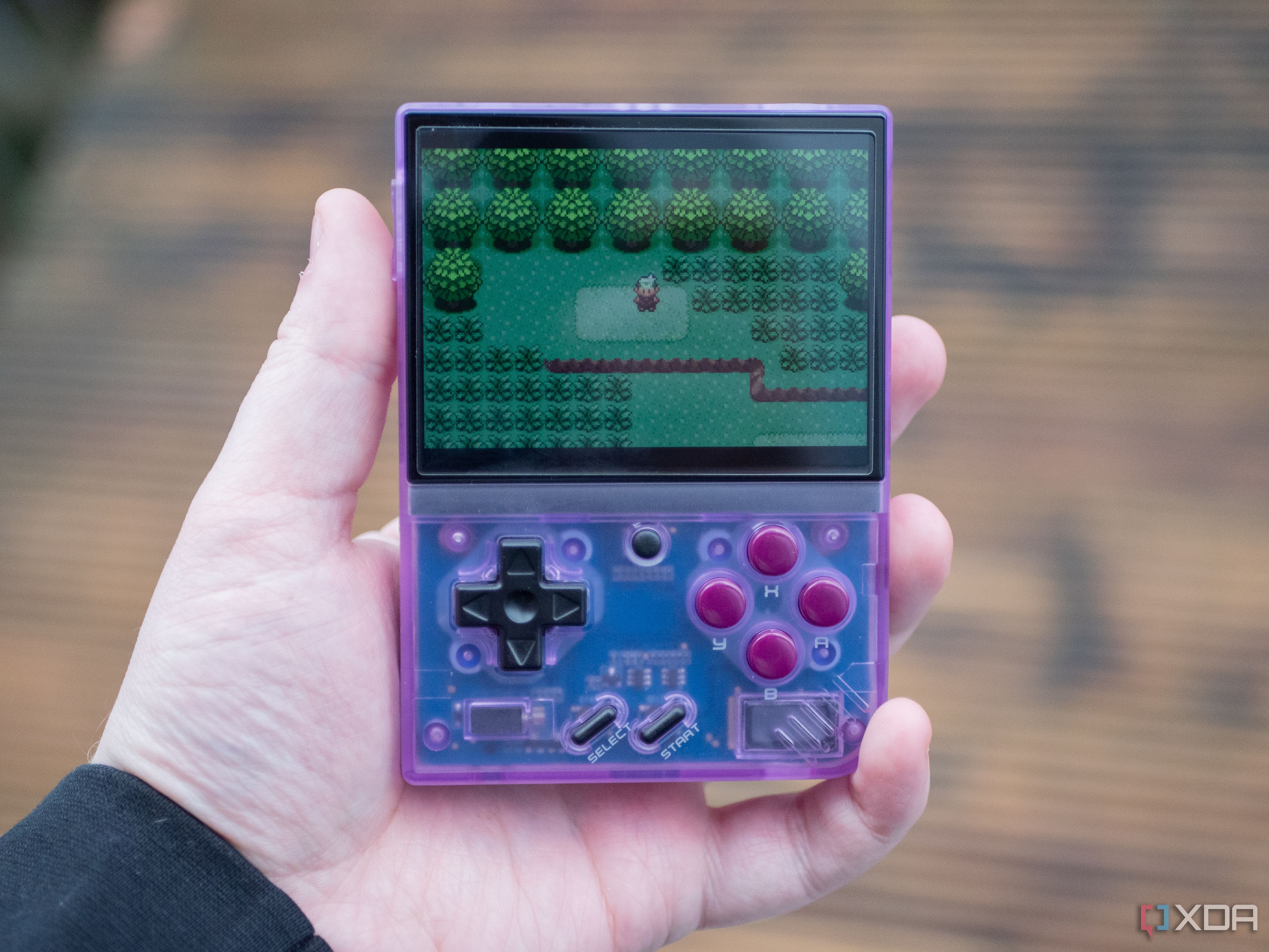 Miyoo Mini+ running Pokemon Emerald in the overworld