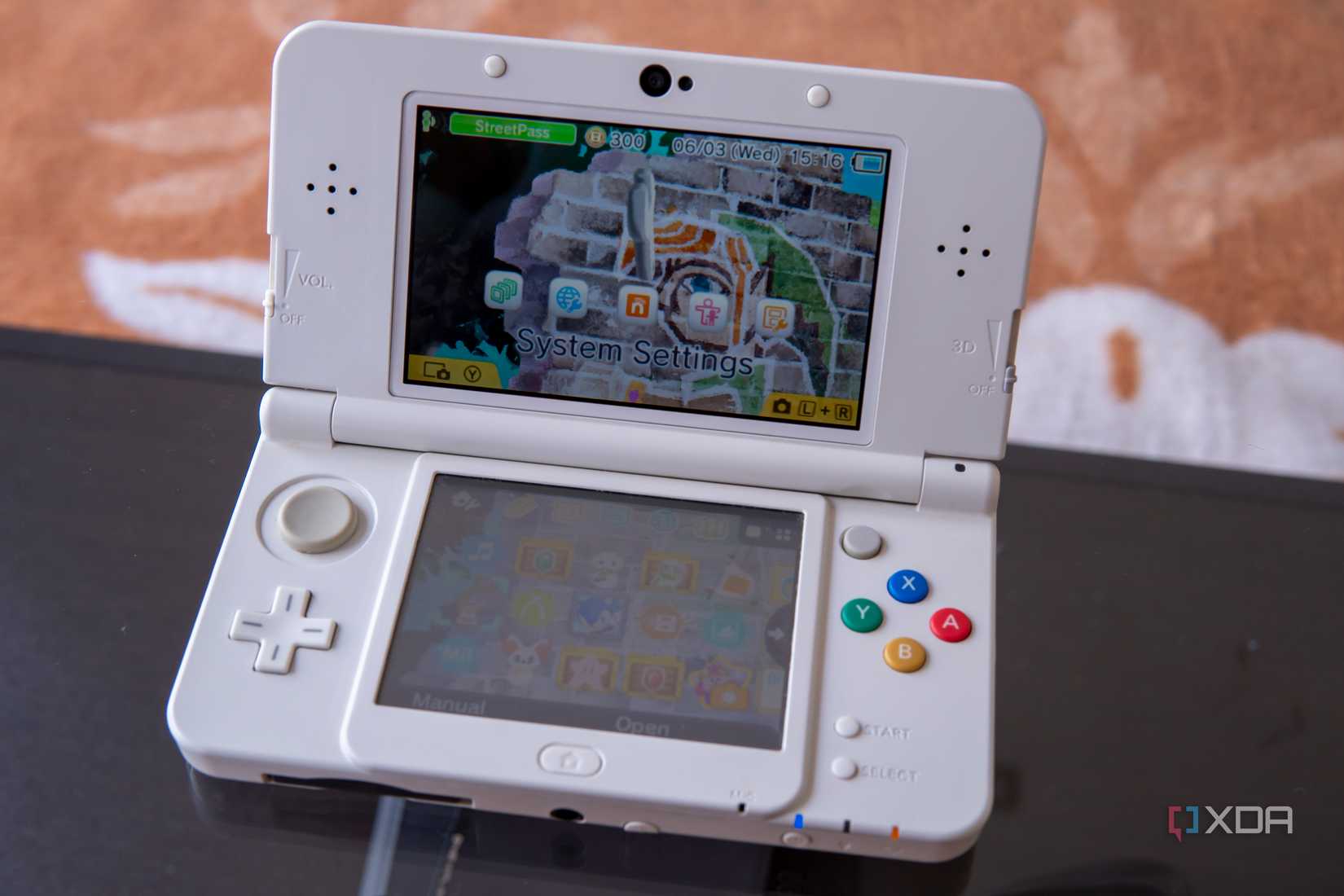 A NIntendo 3DS using a theme from The Legend of Zelda A Link Between Worlds