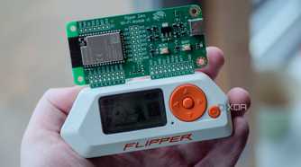 Flipper Zero in-hand with Wi-Fi dev board on top
