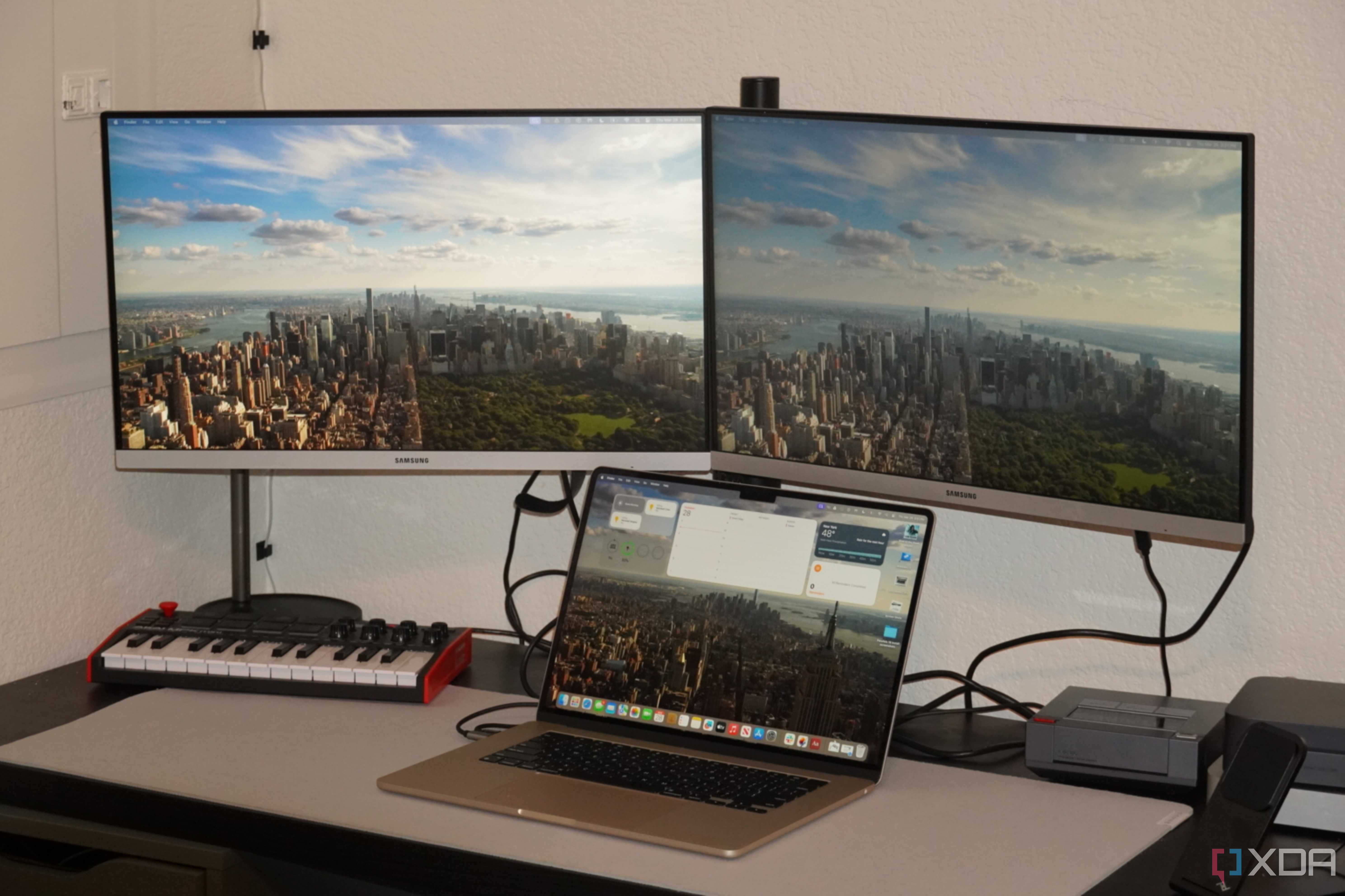 A MacBook Air connected to two external monitors.