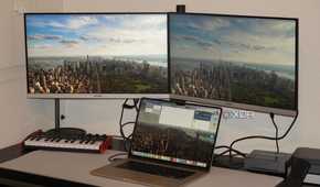 A MacBook Air connected to two external monitors.