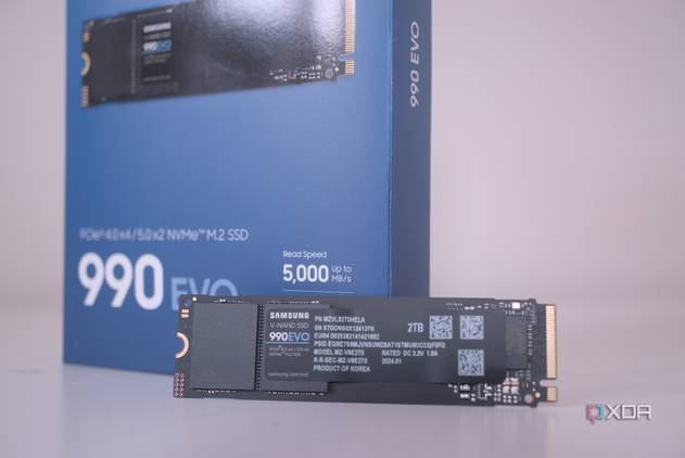 An image of the Samsung 990 Evo hero SSD with its packaging box in the background.