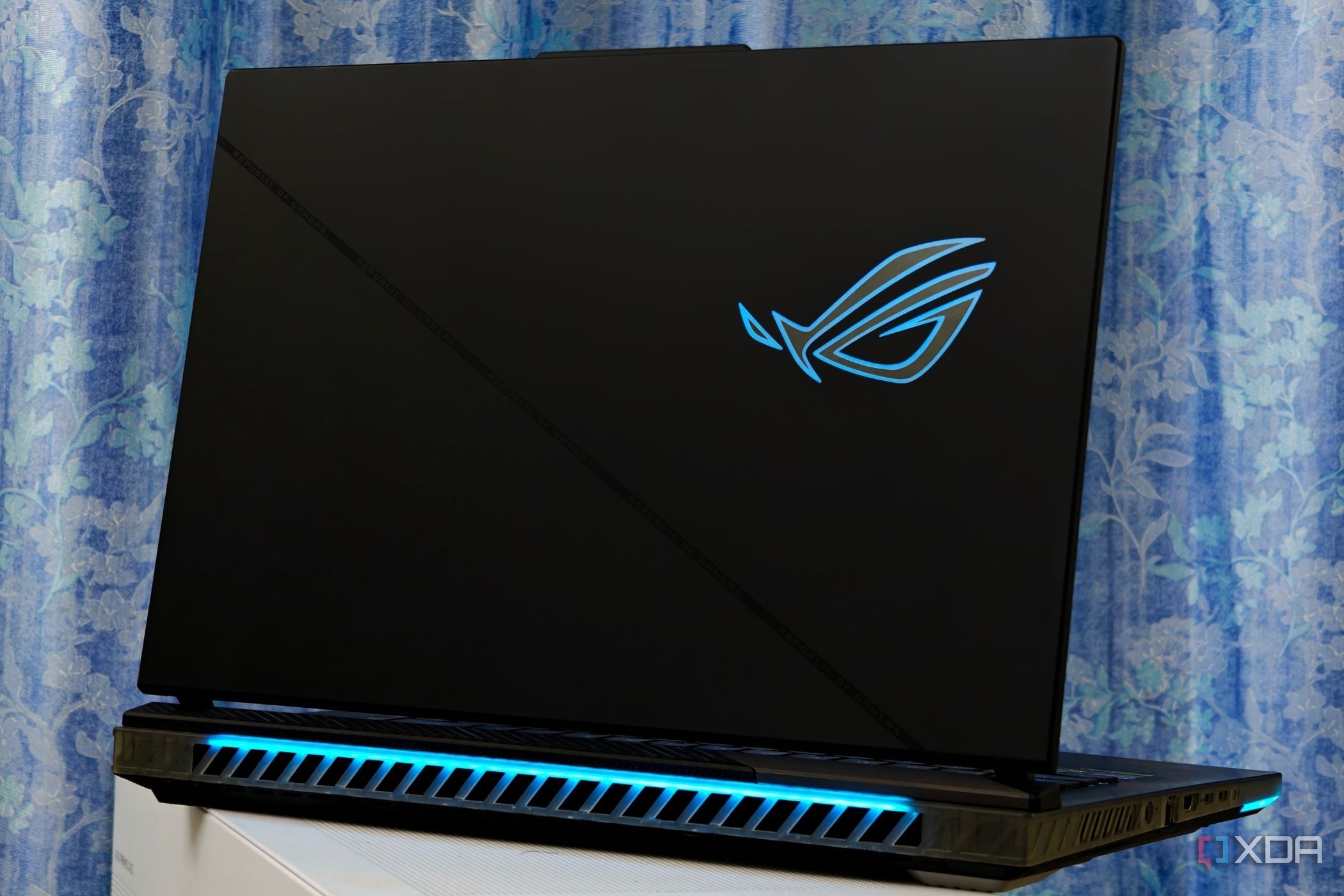 An image showing the back of the Asus ROG Strix Scar 16 gaming laptop with lights.