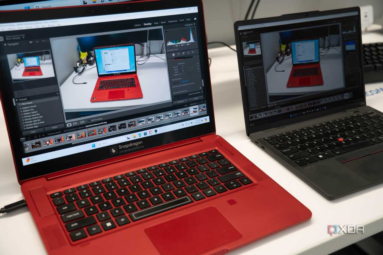 A snapdragon Snapdragon X Elite reference design next to an Intel laptop running the same workload