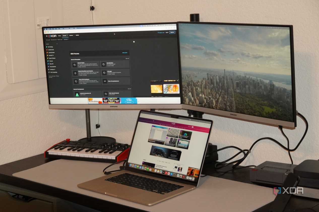 A MacBook Air powering external monitors with the StarTech adapter.